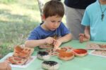 Ateliers Enfants /Confection d' un Talisman en cuit  à L' Archéosite des Fieux Miers
